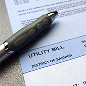 photo of utility bill and pen