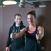 photo of personal trainer with young woman