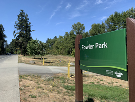 Fowler Park sign near parking lot entrance