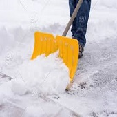 Resident shoveling snow