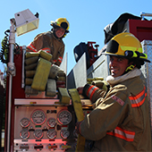 Firefighters on fire truck