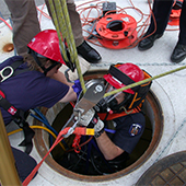 Firefighter in manhole