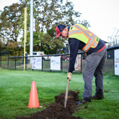 Park Project Worker at Layritz Park - digging a drainage trench