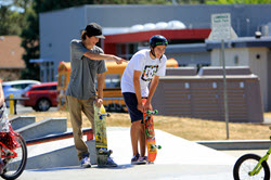 photo of boys with skateboards